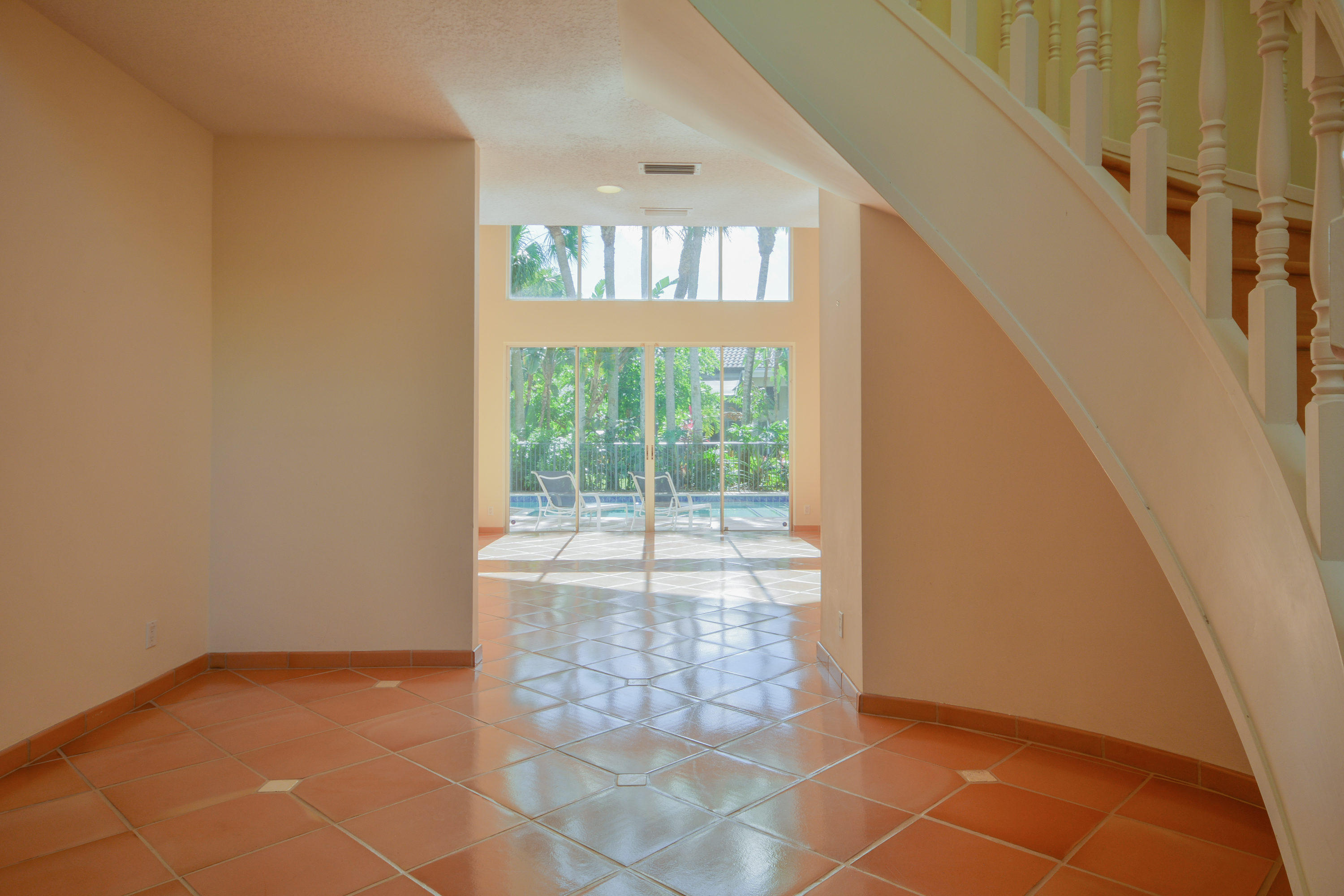 3046 Northwest 61st Street Boca Raton, FL 33496 - Photo 23 of 55 Foyer and Stairs