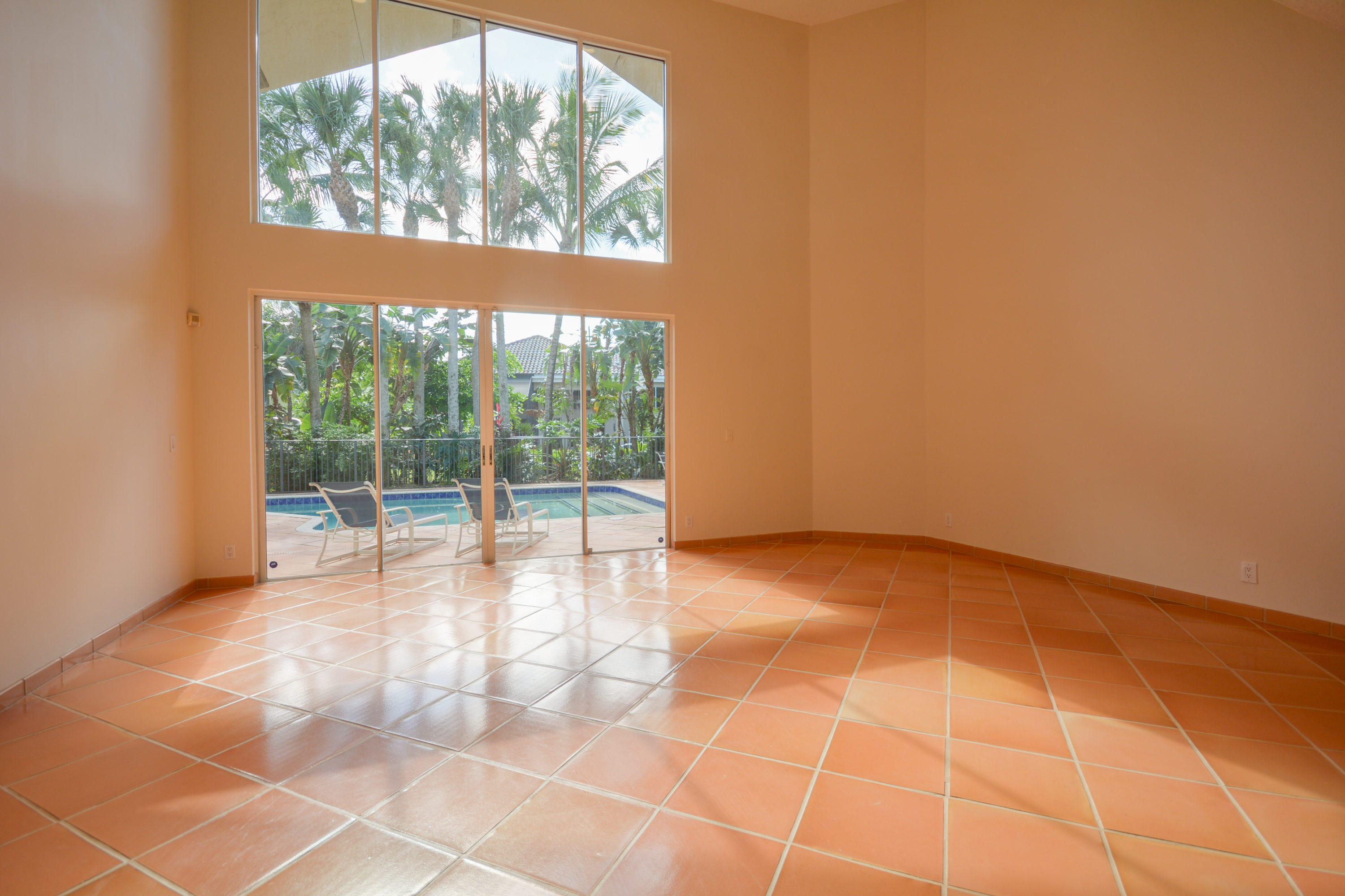 3046 Northwest 61st Street Boca Raton, FL 33496 - Photo 40 of 55 Living Room and Pool