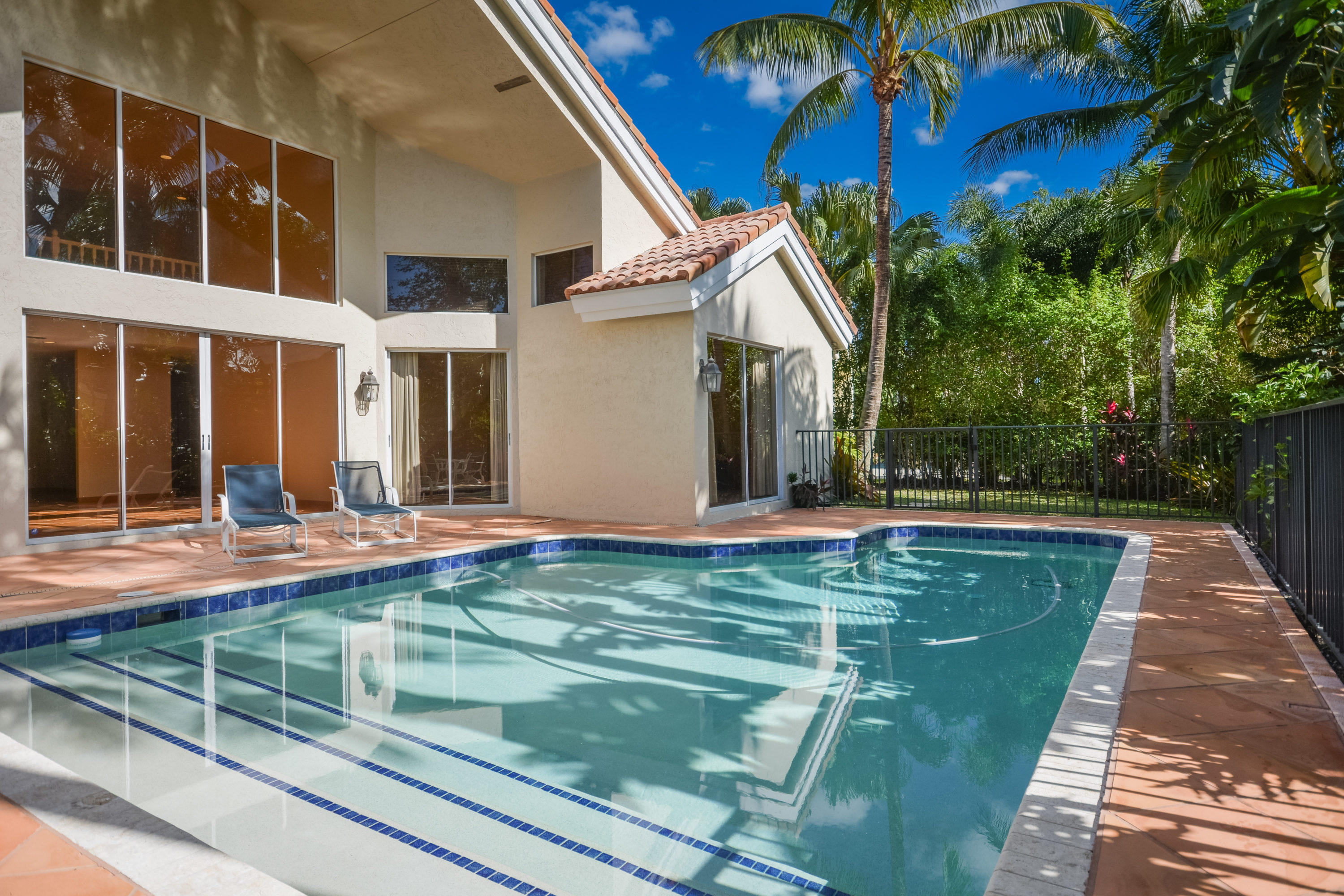 3046 Northwest 61st Street Boca Raton, FL 33496 - Photo 49 of 55 Pool and entry