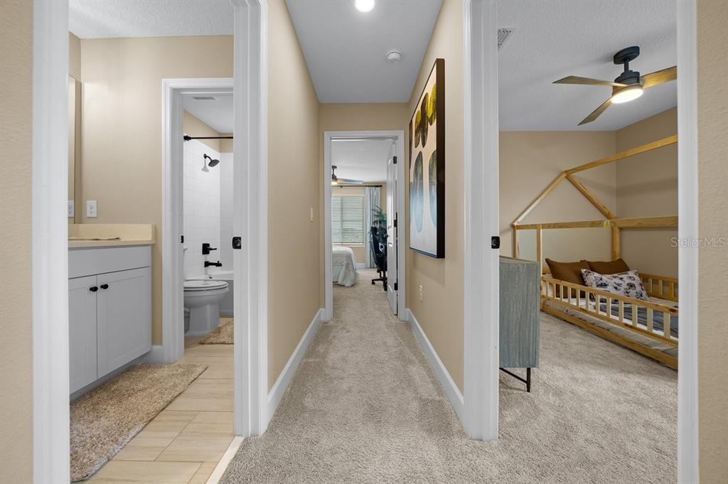 3916 Southern Vista Loop St. Cloud, FL 34772 - Photo 37 of 52 a view of a hallway view with three rooms