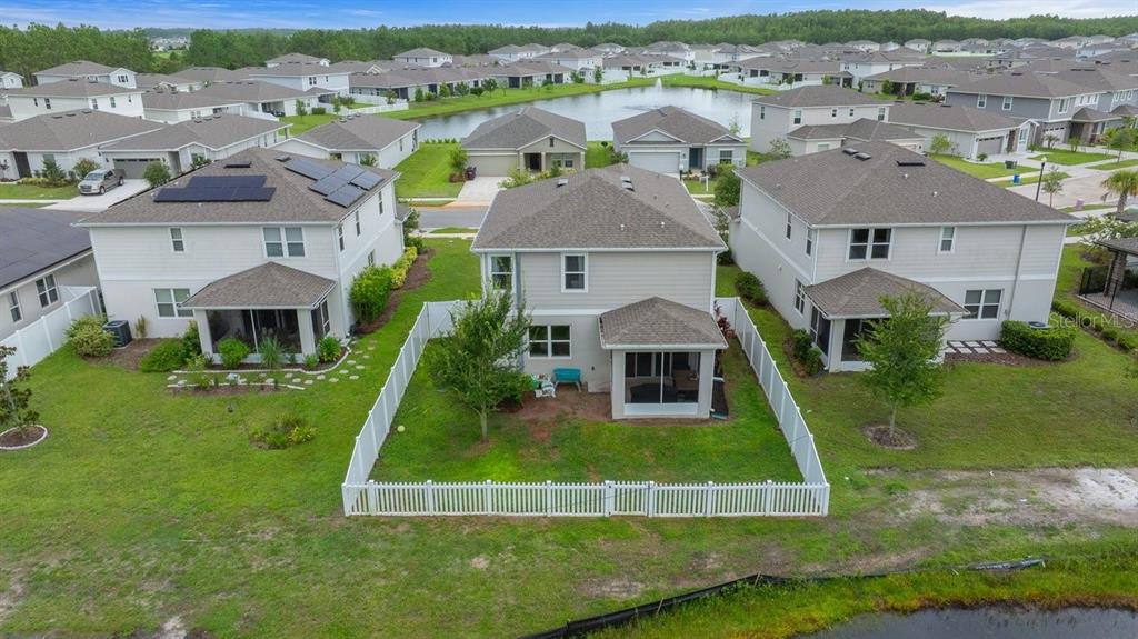 3916 Southern Vista Loop St. Cloud, FL 34772 - Photo 45 of 52 an aerial view of a house