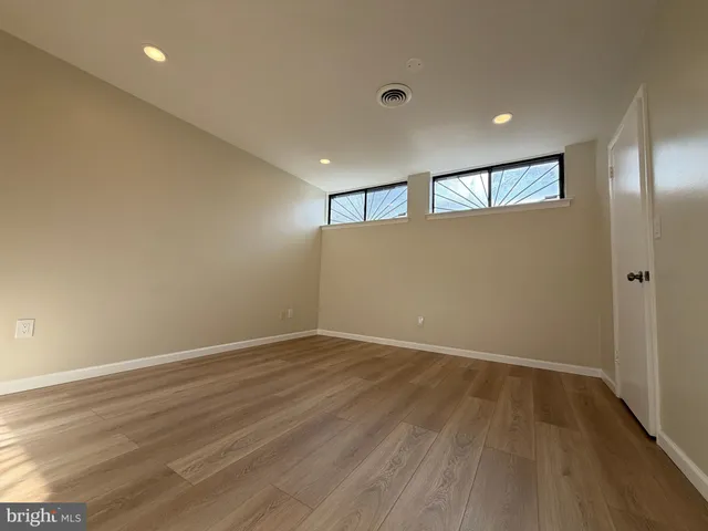 a view of a room with racks on the wall