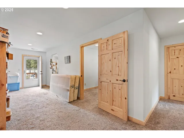 a living room with furniture and a area
