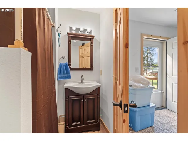 a view of bathroom with dual sinks