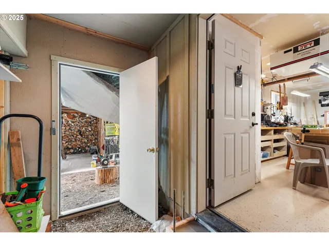 a view of living room filled with furniture and furniture