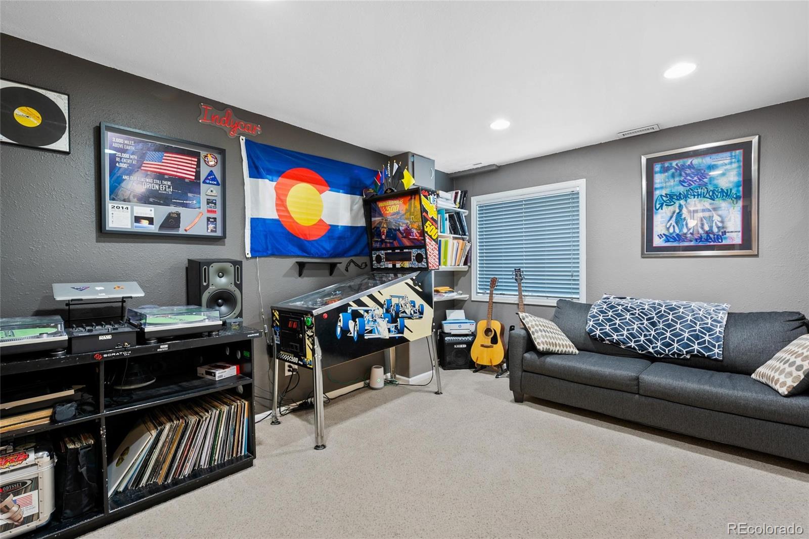 9836 South Castle Ridge Circle Highlands Ranch, CO 80129 - Photo 17 of 28 a living room with furniture and a gym equipment