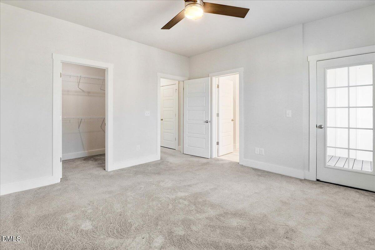 857 South Franklin Street Wake Forest, NC 27587 - Photo 16 of 30 an empty room with windows and closet