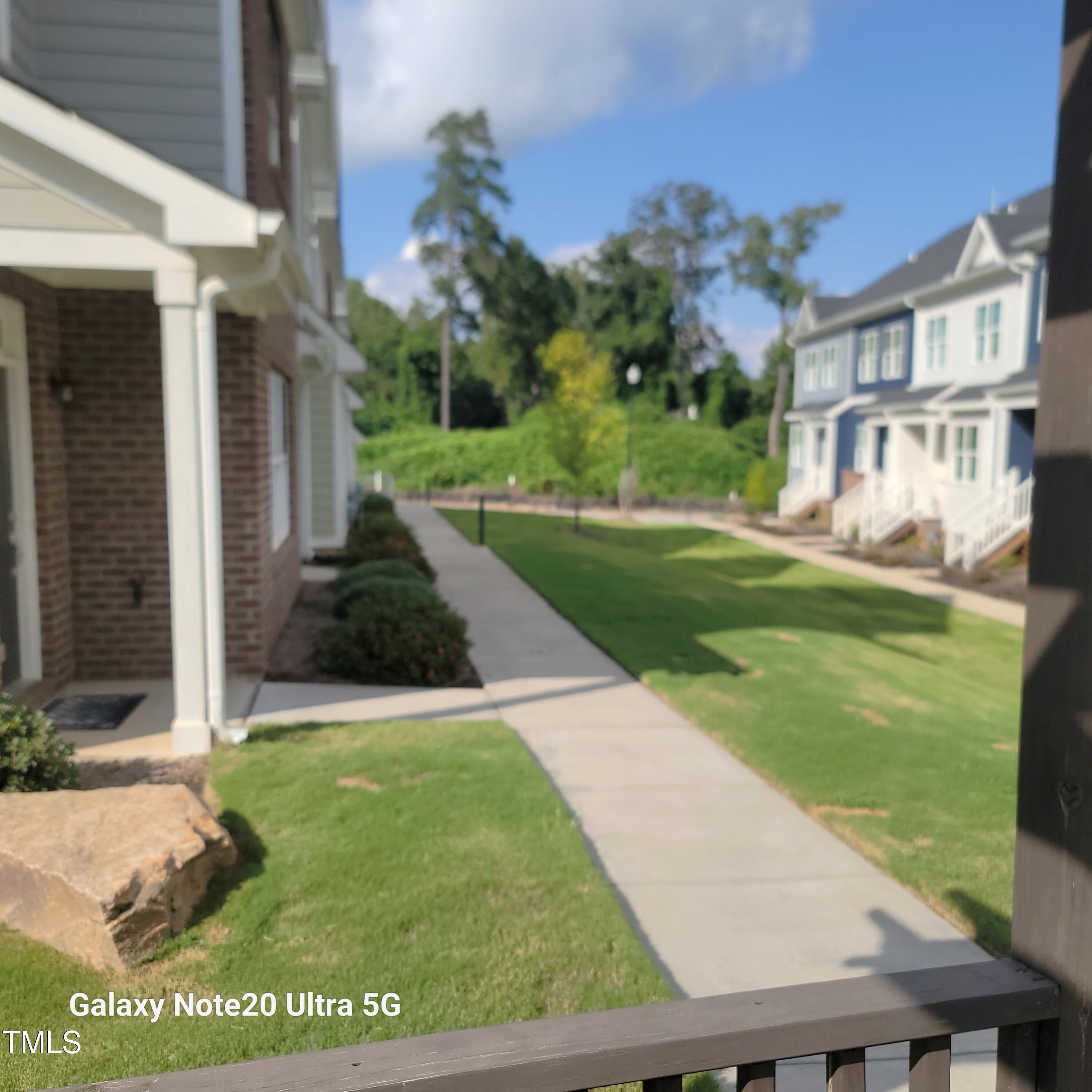 857 South Franklin Street Wake Forest, NC 27587 - Photo 26 of 30 a view of backyard with a garden and plants