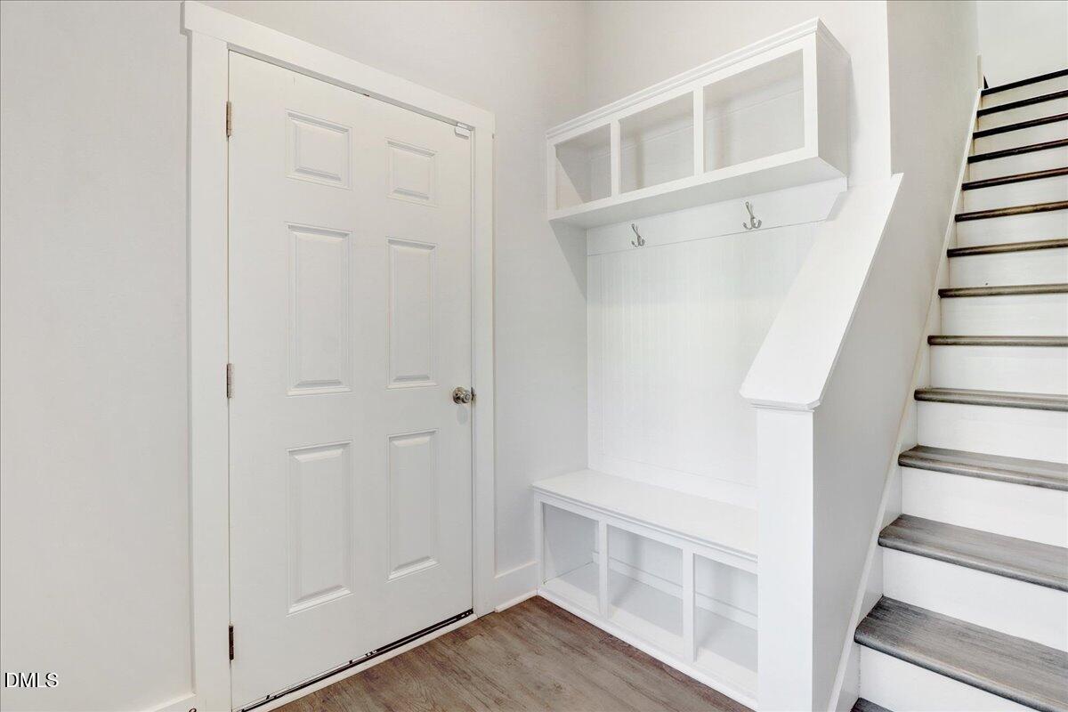 857 South Franklin Street Wake Forest, NC 27587 - Photo 5 of 30 a view of a hallway with wooden floor and entryway