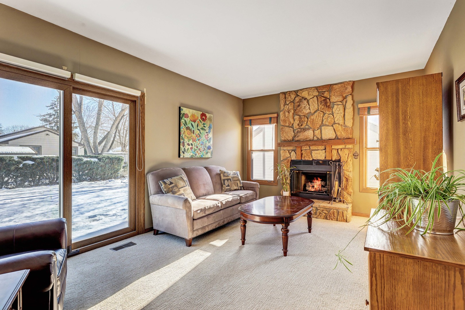 2308 Modaff Road Naperville, IL 60565 - Photo 15 of 46 a living room with furniture and a fireplace