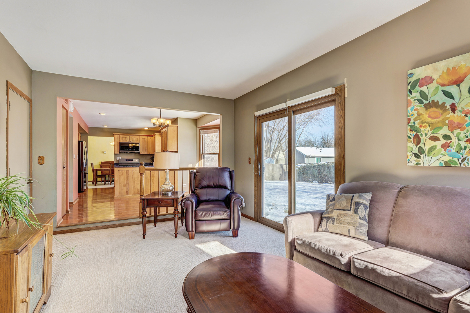 2308 Modaff Road Naperville, IL 60565 - Photo 16 of 46 a living room with furniture and a floor to ceiling window