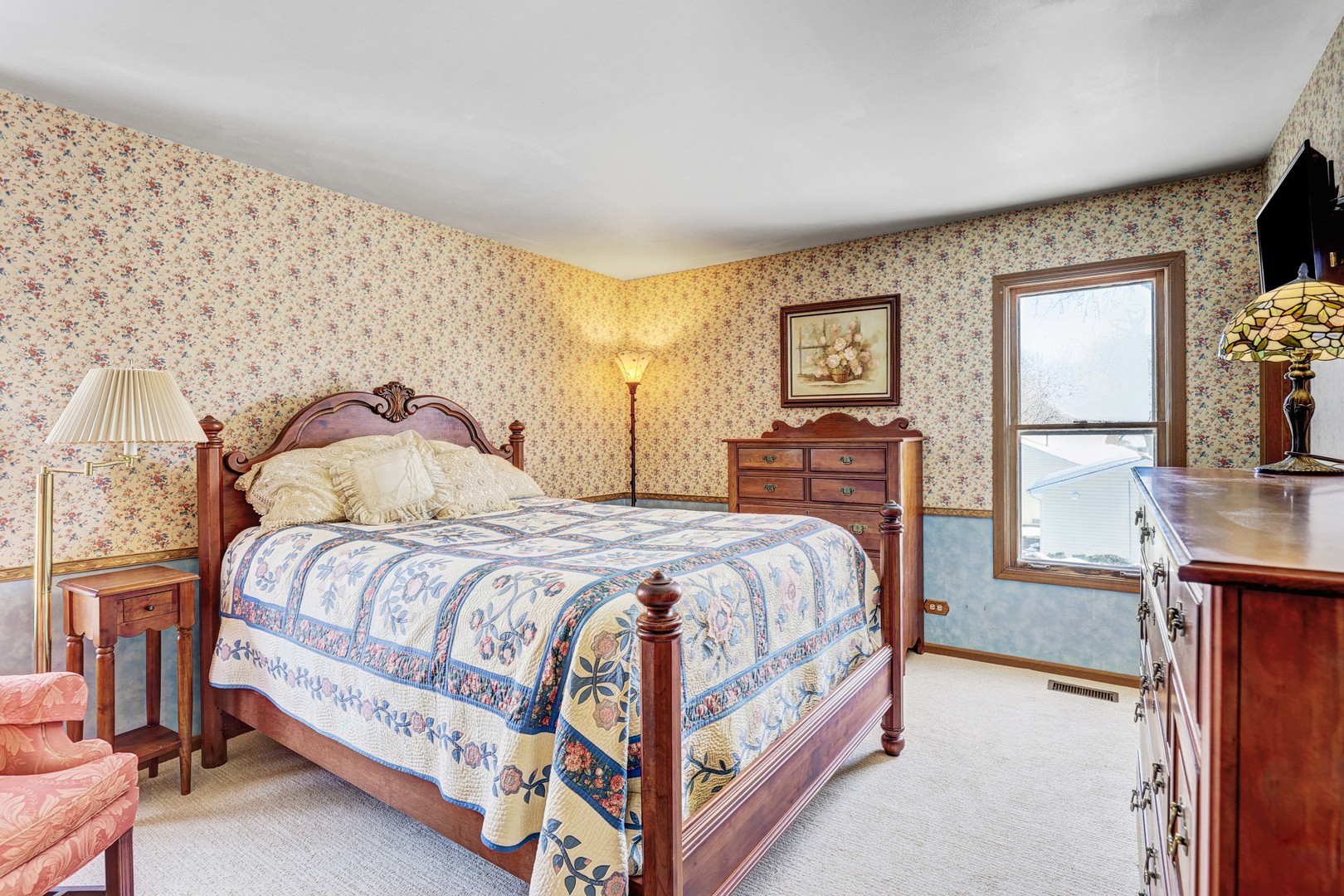 2308 Modaff Road Naperville, IL 60565 - Photo 24 of 46 a bedroom with a bed and a flat screen tv