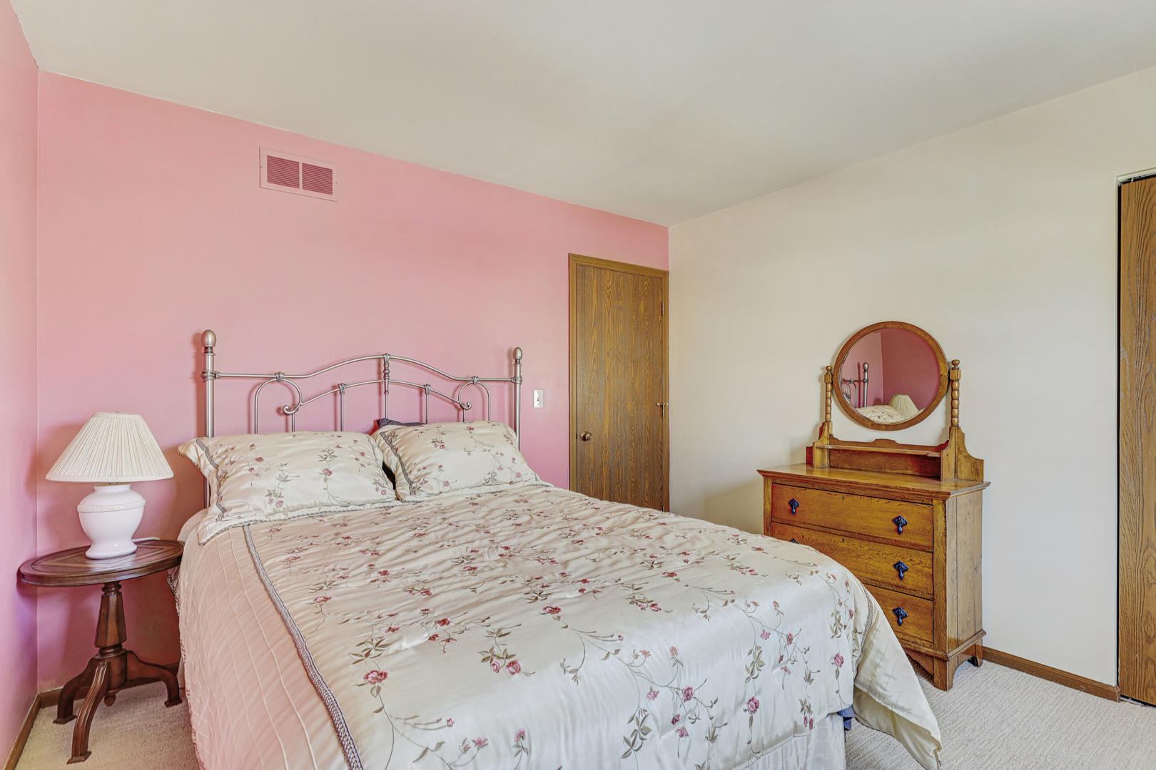 2308 Modaff Road Naperville, IL 60565 - Photo 29 of 46 a bedroom with a bed and a chandelier