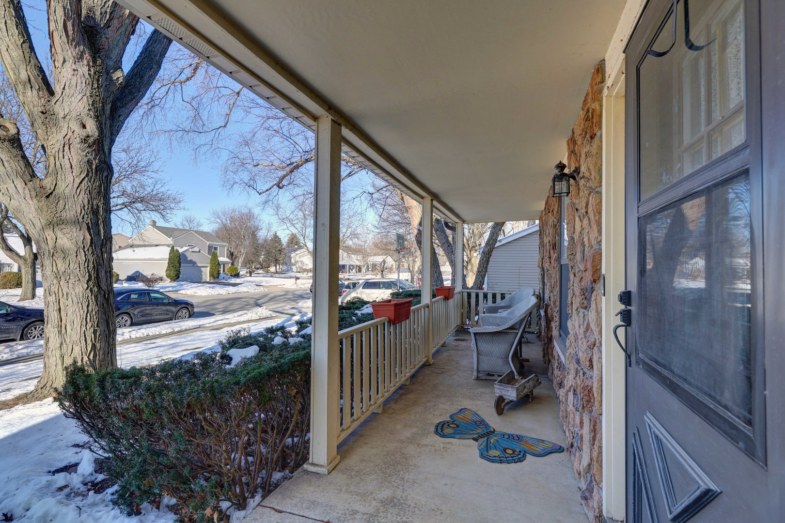 2308 Modaff Road Naperville, IL 60565 - Photo 4 of 46 a view of a porch with wooden floor