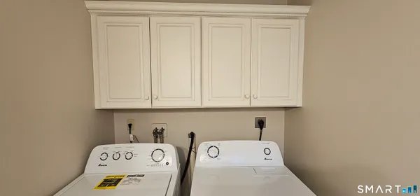 a room with furniture and a mirror