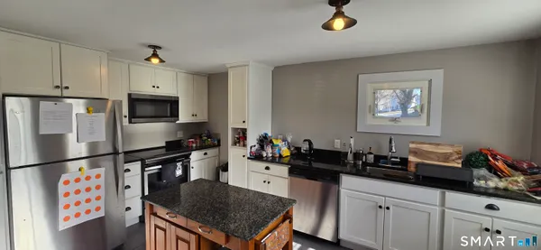 a view of a dining room with furniture