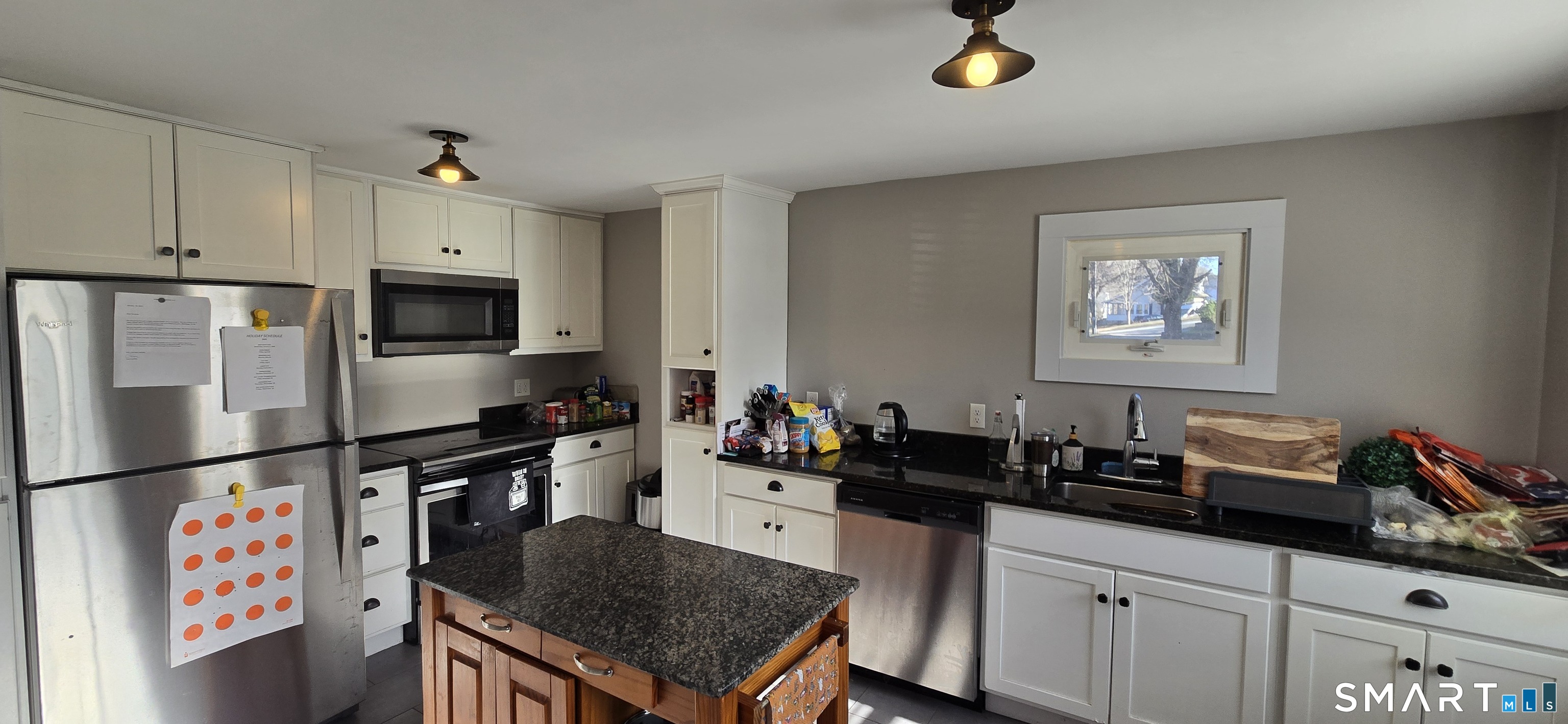 87 Main Street Deep River, CT 06417 - Photo 7 of 37 a kitchen with stainless steel appliances granite countertop a sink stove and refrigerator