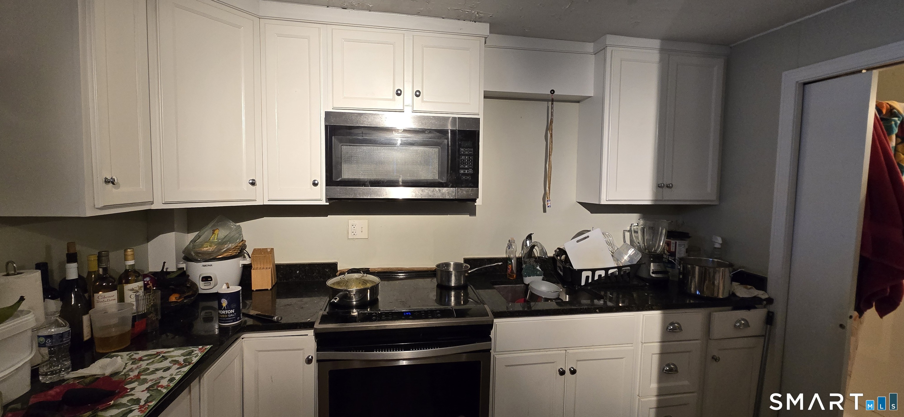 87 Main Street Deep River, CT 06417 - Photo 10 of 37 a kitchen with stainless steel appliances a sink stove and cabinets