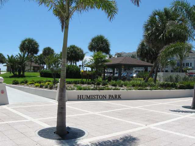 837 Camelia Lane, Unit 7 Vero Beach, FL 32963 - Photo 13 of 20 a front view of a house with yard and palm tree
