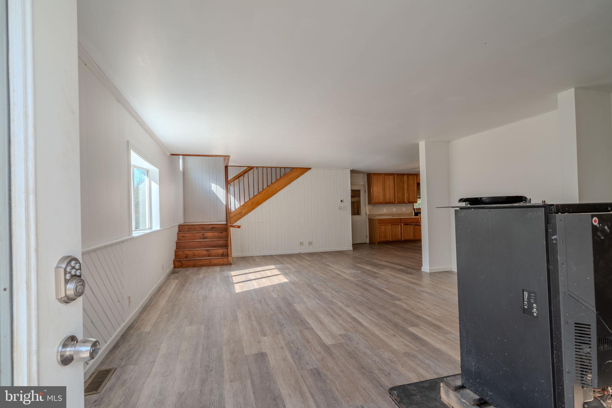 644 Madisonburg Pike Road Madisonburg, PA 16852 - Photo 13 of 44 wooden floor in an empty room