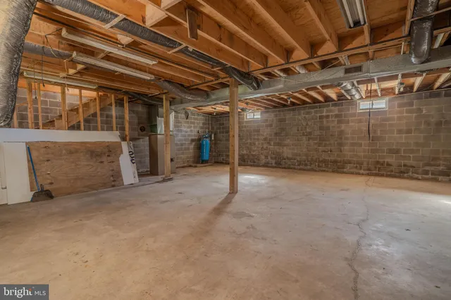 a view of an empty room with a garage
