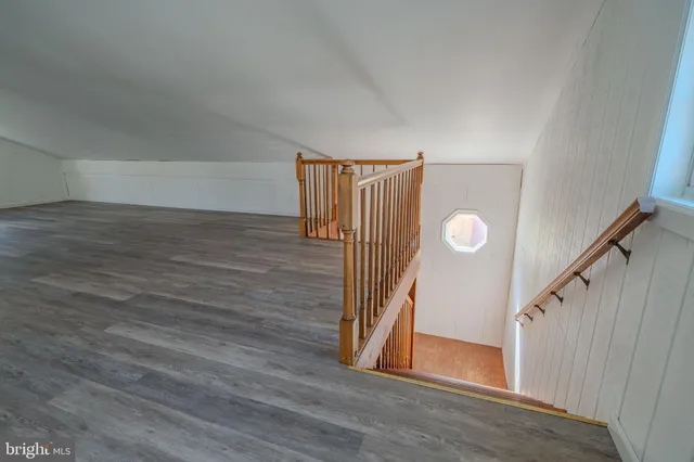 a view of entryway with wooden floor