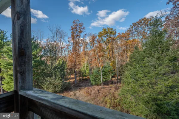 a view of a yard from a balcony