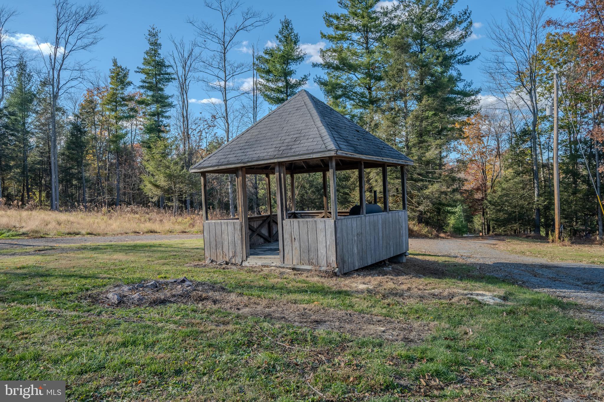 644 Madisonburg Pike Road Madisonburg, PA 16852 - Photo 28 of 44 a view of a house with yard and sitting area