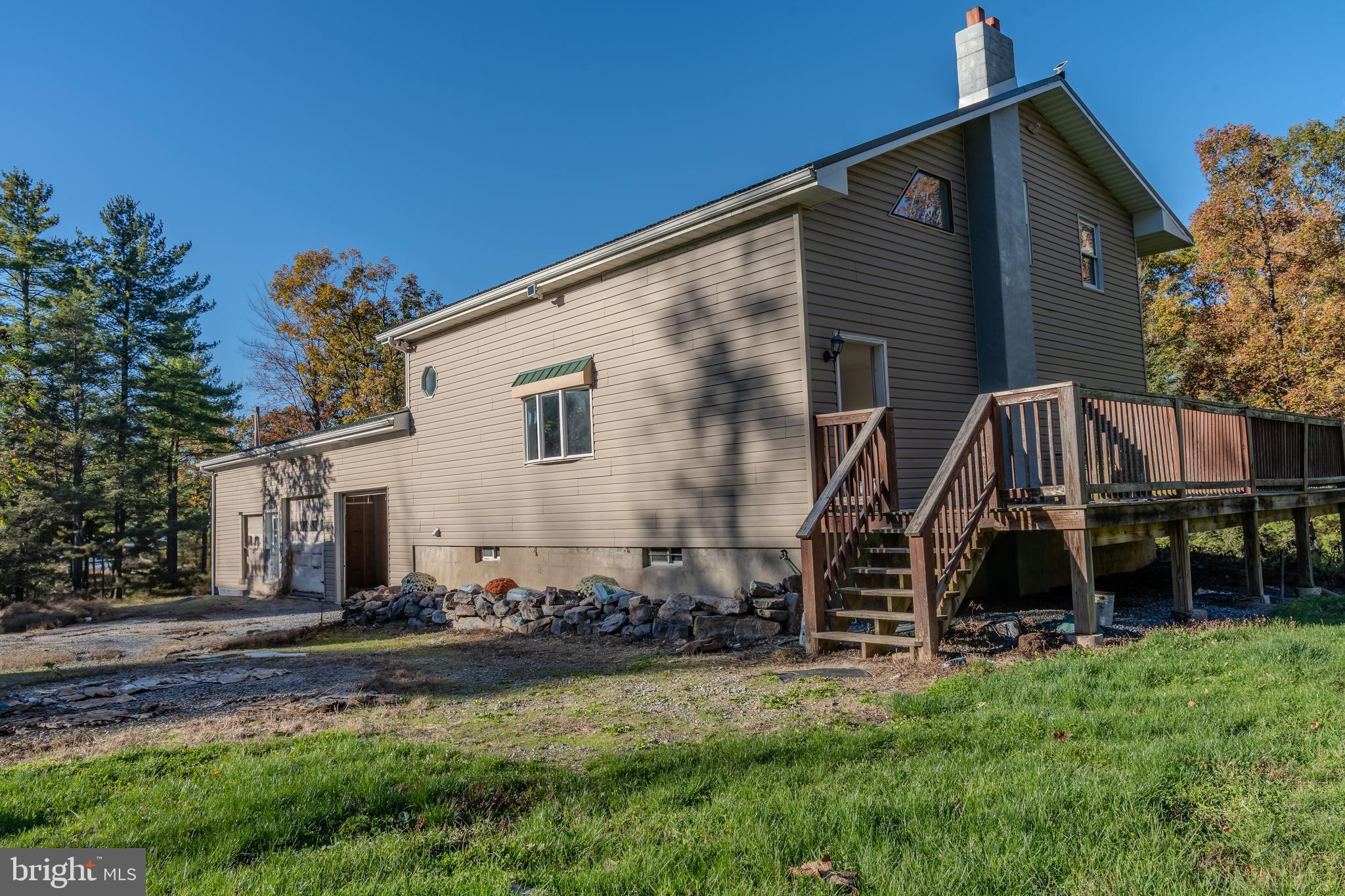 644 Madisonburg Pike Road Madisonburg, PA 16852 - Photo 38 of 44 a view of a house with backyard
