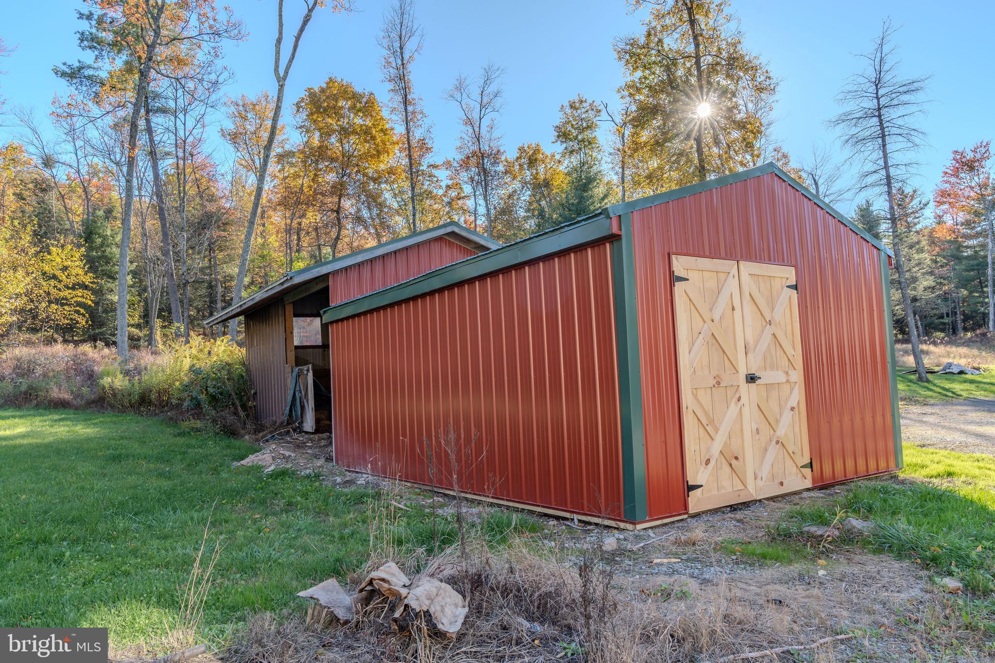 644 Madisonburg Pike Road Madisonburg, PA 16852 - Photo 41 of 44 a backyard of a house with lots of green space