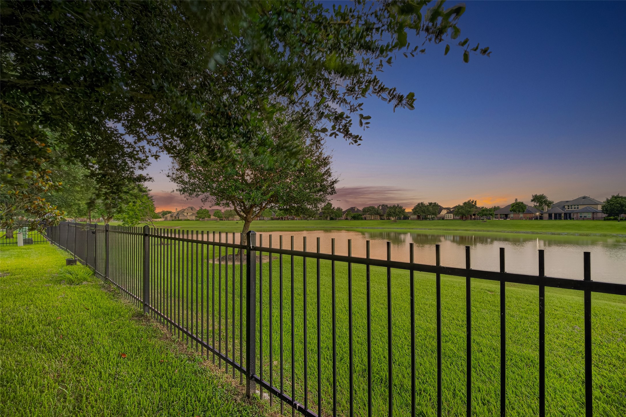 7930 Summer Night Lane Rosenberg, TX 77469 - Photo 45 of 48 Fenced backyard offering peaceful views and plenty of open green space.