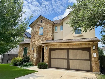 front view of a house with a small yard