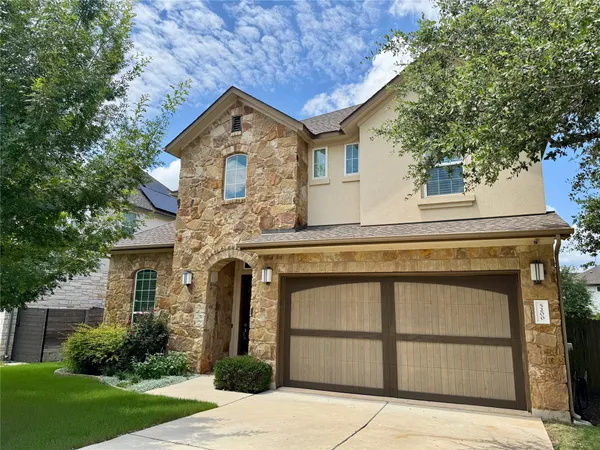 front view of a house with a small yard