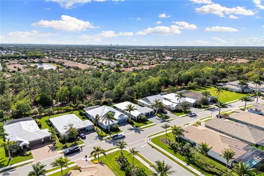 14796 Windward Lane Naples, FL 34114 - Photo 36 of 50 an aerial view of residential houses with outdoor space