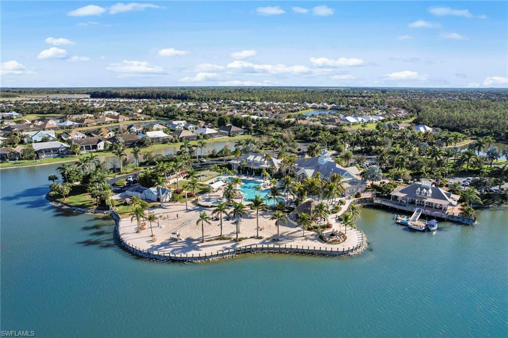 14796 Windward Lane Naples, FL 34114 - Photo 49 of 50 an aerial view of a house with a garden and lake view