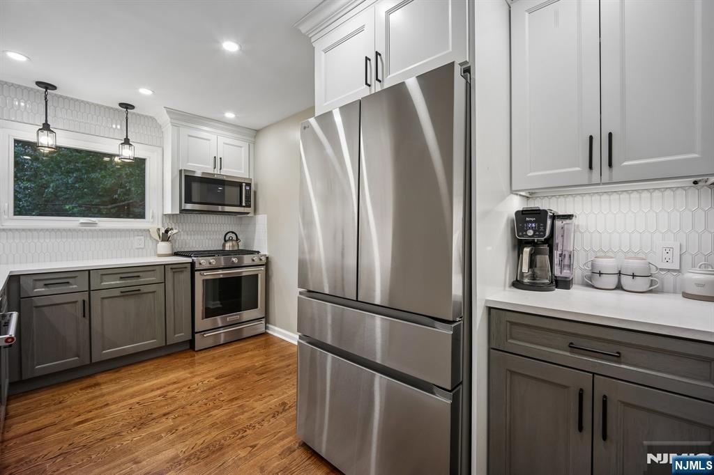 23 Andover Place Bloomfield, NJ 07003 - Photo 13 of 42 a kitchen with stainless steel appliances a refrigerator sink and microwave