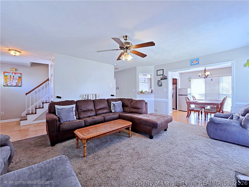 5218 Pringle Way Hope Mills, NC 28348 - Photo 6 of 43 a living room with furniture and a ceiling fan