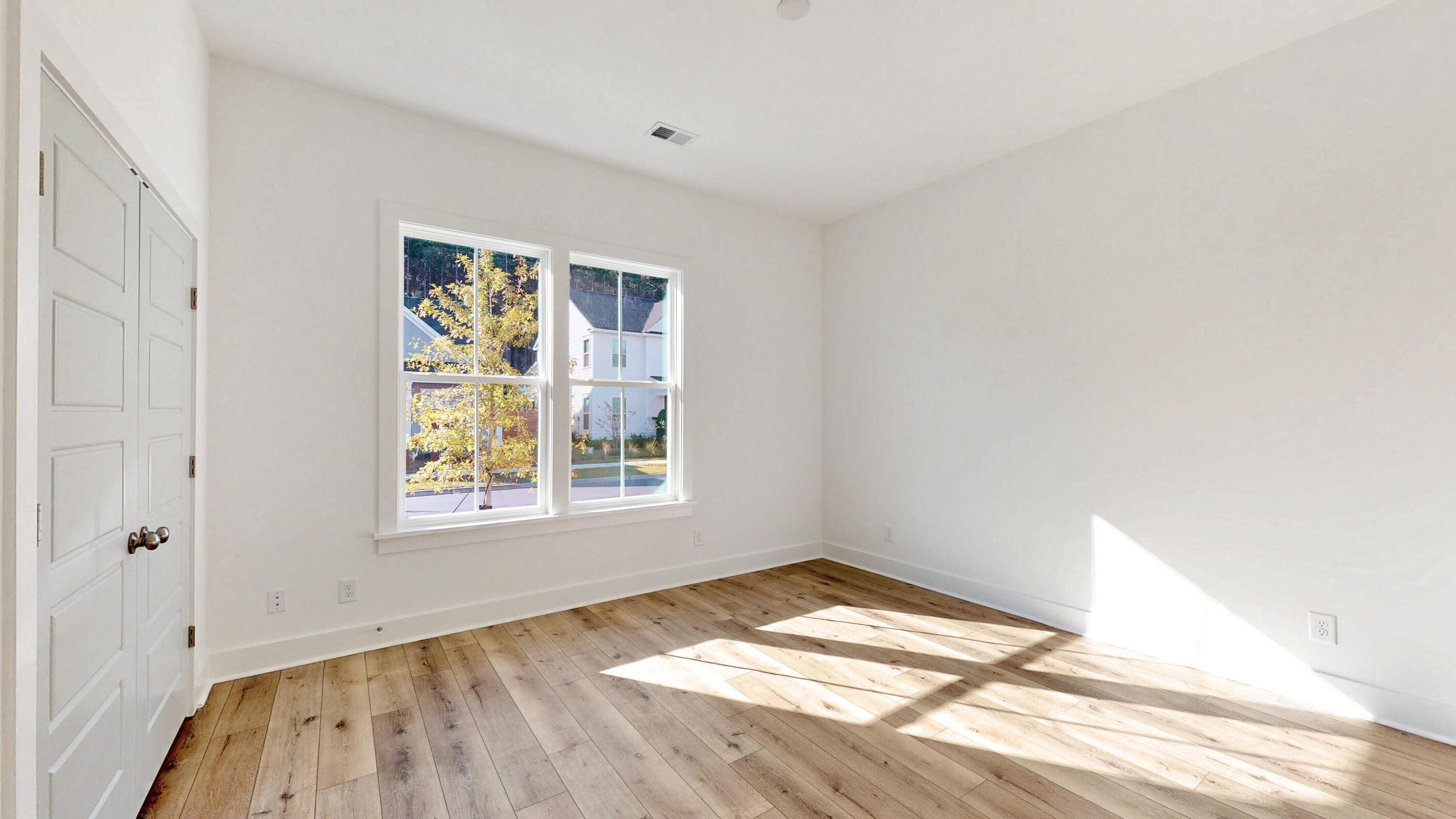 1586 Charming Nancy Road Charleston, SC 29412 - Photo 23 of 37 Example guest bedroom with hardwoods