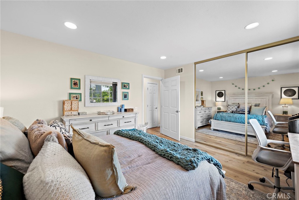 22 Exeter, Unit 23 Irvine, CA 92612 - Photo 2 of 30 a living room with furniture and a large window