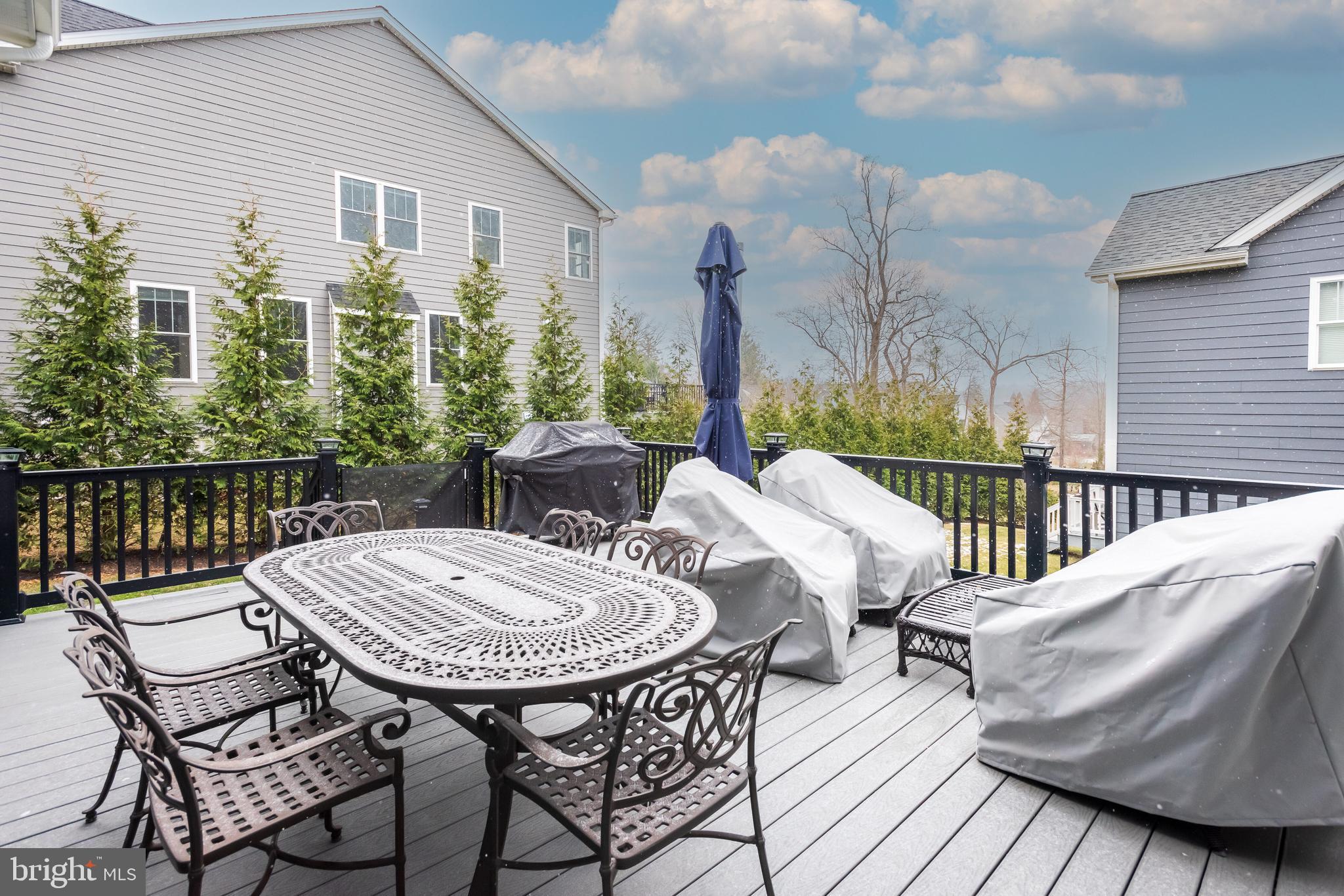 2 West 8th Street Media, PA 19063 - Photo 51 of 51 a view of a patio with a table and chairs