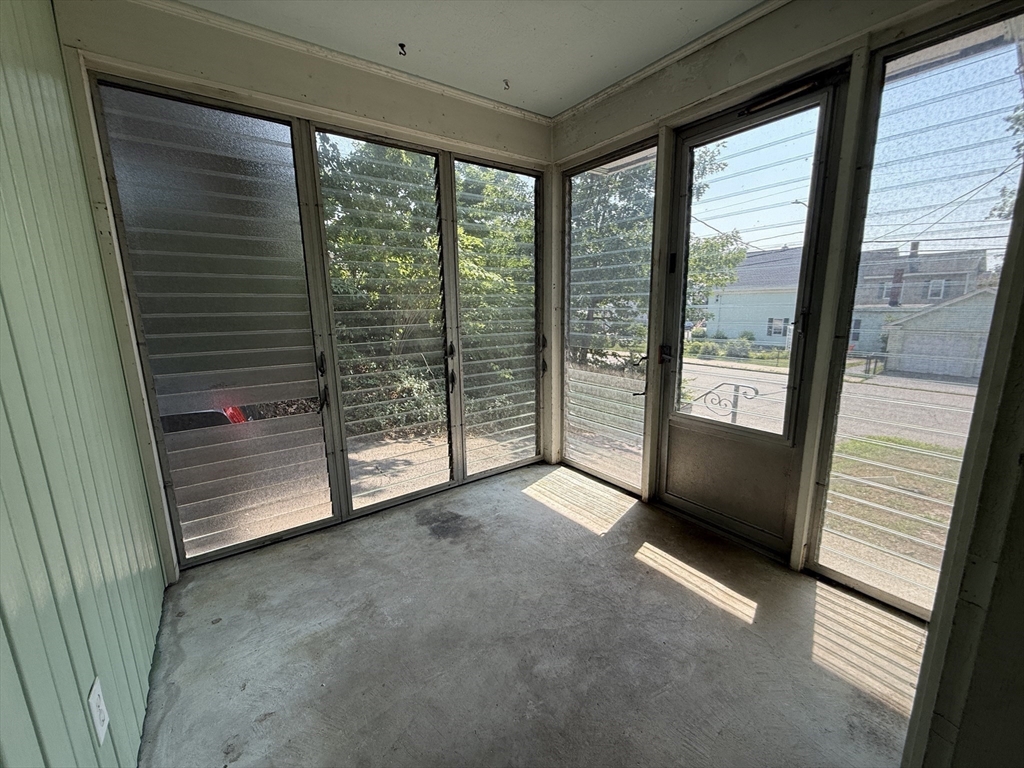 36 5th Avenue Lowell, MA 01854 - Photo 15 of 16 a view of an empty room with windows