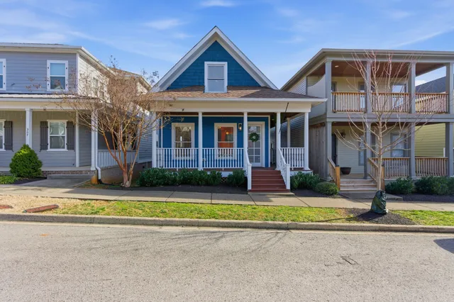 front view of a house with a yard