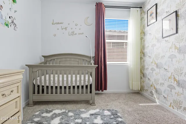 a view of a bedroom with a window