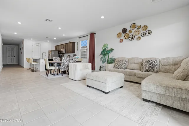 a living room with furniture and a couch