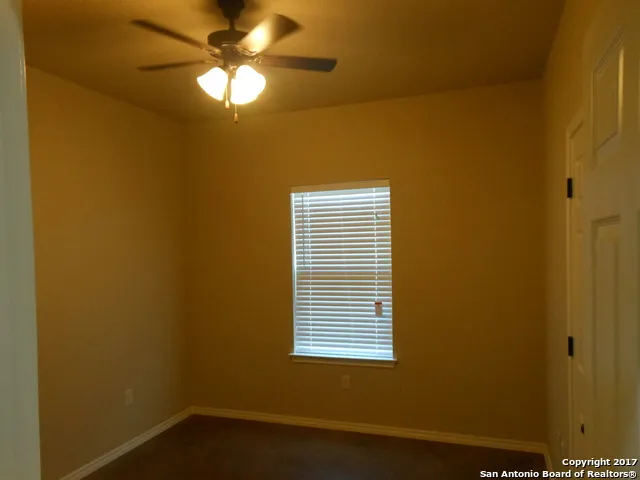 a view of a livingroom with a fan