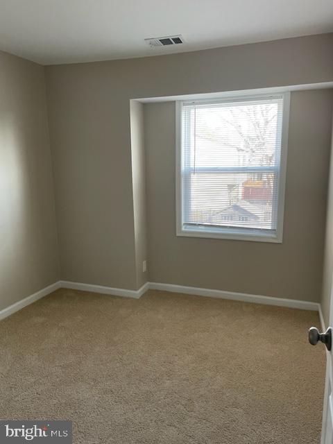 17439 Hughes Road Poolesville, MD 20837 - Photo 14 of 25 an empty room with a window