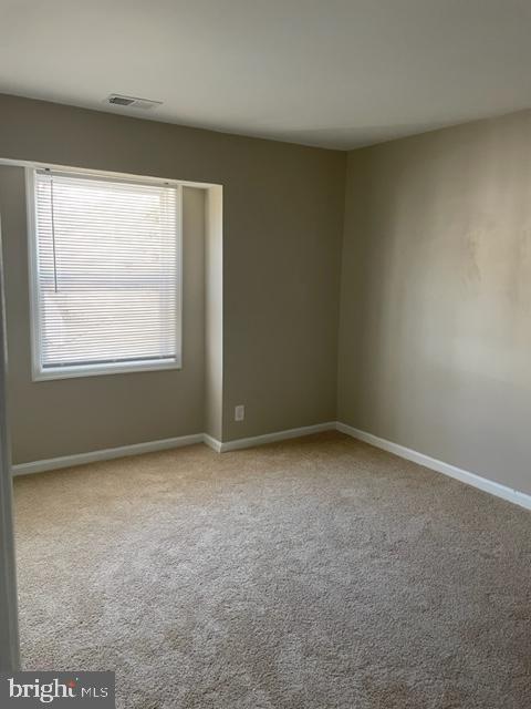 17439 Hughes Road Poolesville, MD 20837 - Photo 17 of 25 an empty room with a window