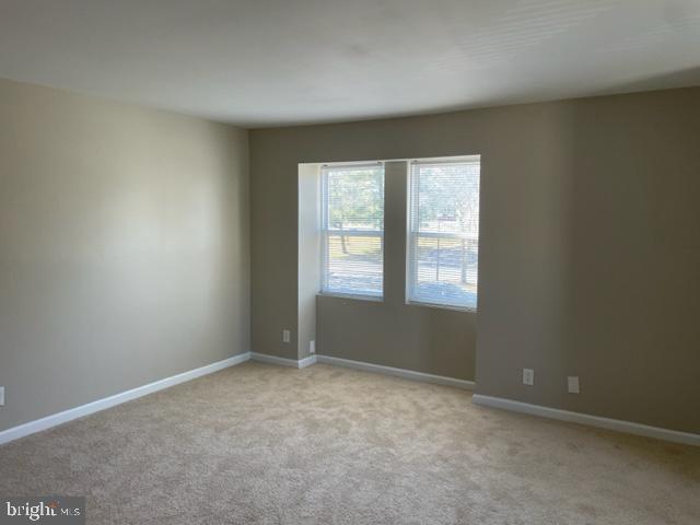 17439 Hughes Road Poolesville, MD 20837 - Photo 18 of 25 an empty room with a window