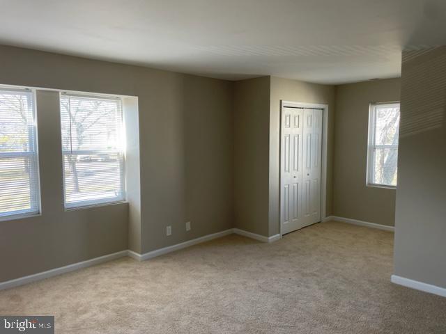 17439 Hughes Road Poolesville, MD 20837 - Photo 19 of 25 an empty room with windows
