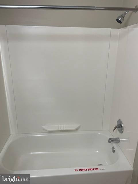 17439 Hughes Road Poolesville, MD 20837 - Photo 23 of 25 a bathroom with a bathtub